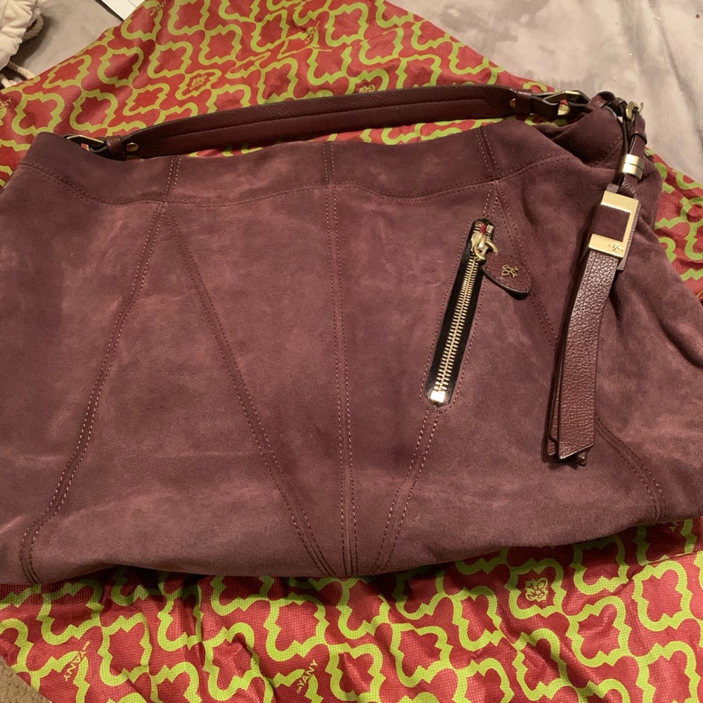 Organized Italian suede sold in QVC